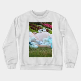 pregnant woman in the park surrounded by stuffed toys Crewneck Sweatshirt